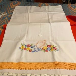 Vintage hands in Prayer decorate these pillow cases